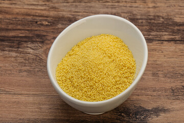 Raw cous cous heap in the bowl