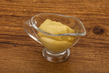 Dijon mustard sauce in the bowl