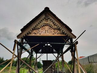 The roof of a wooden house in the tropical country of Indonesia