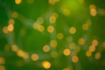 Obraz premium Blurred christmas background. Red bokeh abstract light backdrop. Beautiful images from steam and lights. Magic light bokeh