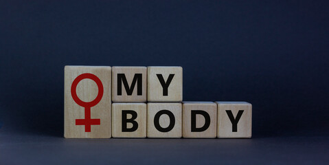 My body and female symbol. Wooden cubes with words 'my body' on beautiful grey background. Motivation and human rights concept, copy space.