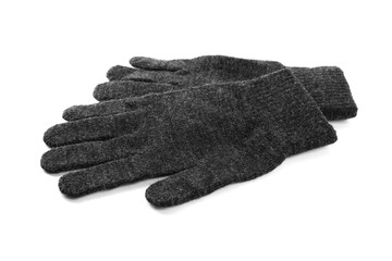 Grey woolen gloves on white background. Winter clothes