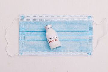 coronavirus vaccine with sanitary mask