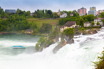 The Rhine Falls in  Switzerland.  Rheinfall is the biggest waterfall in Europe