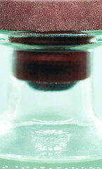 Transparent glass bottle neck close up