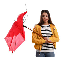Emotional woman with umbrella broken by gust of wind on white background © New Africa