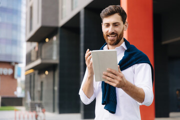 Male entrepreneur having video call on digital tablet