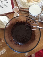 Making a chocolate cake with mixer, messy cooking table video