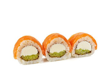 Three sushi rolls with cream cheese on white