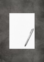 Blank White A4 paper sheet and pen mockup template on dark concrete background