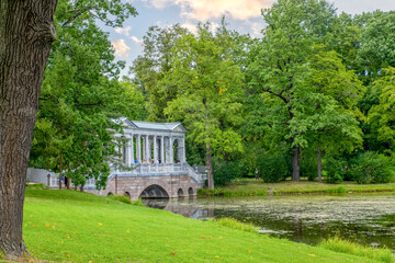 Fototapeta na wymiar St. Petersburg, Pushkin, Russia. August 22, 2020. Historical architectural wonderful building made of marble material in Catherine Park. Horizontal orientation, selective focus.