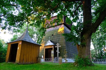 Fototapeta na wymiar Wooden former Lemko Greek Catholic church of the Ascension in Pielgrzymka, Low Beskid Mountains, Poland