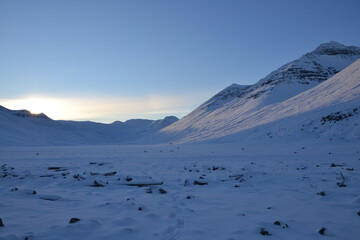 Winter landscape in the north of Iceland. Walk in a deserted valley in the sunshine.