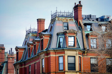 The roof line of a brownstone building