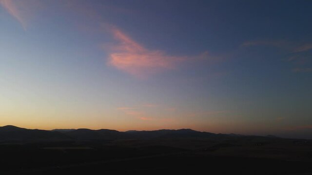 Pink Cloud during Sunset on California Mountain Range facing West