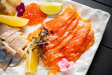 fish plate with lemon and caviar