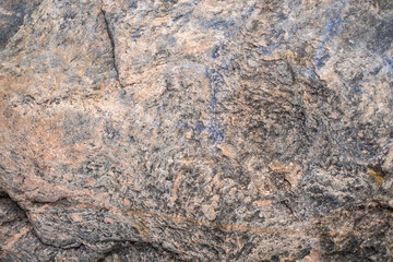 Surface of rough rocky cliff
