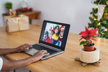 Senior woman on a video call with her family at home for christmas - Lockdown, coronavirus and social distance concept