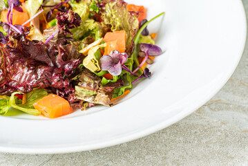 fresh salad with salmon and vegetables