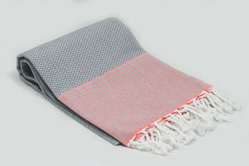 Peshtemal Turkish bath cotton towel folded textile. Beautiful bright colors with natural light background. Perfect online market digital shop sales.