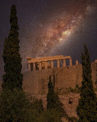 Parthenon ancient temple on Acropolis of Athens Greece under dramatic night sky