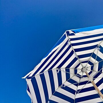beach umbrella and blue sky