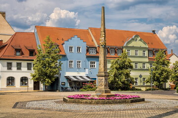 delitzsch, deutschland - platz mit postmeilensäule
