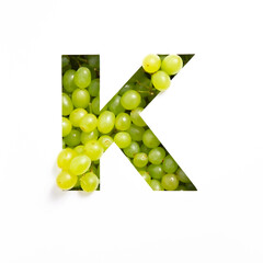 Green grape alphabet, letter K of English abc isolated on white. Appetizing typeface made of fresh berries