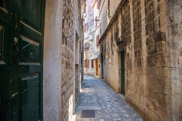 Fototapeta na wymiar View of the old city of Trogir, Mediterranean architecture, narrow streets