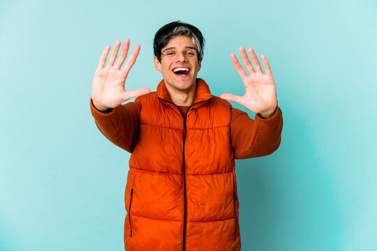 Young caucasian skinny man expressing emotions isolated on blue background