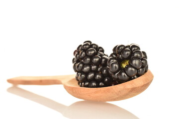 Organic blackberries, close-up, on a white background.