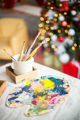 Interior artist's workshop, loft with brick walls, a palette of colors