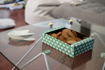 Ginger cookies in a box on a table - 396635709
