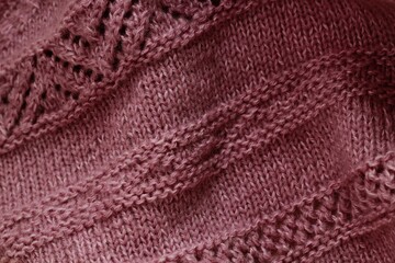 Knitted wool texture of a dusty pink color