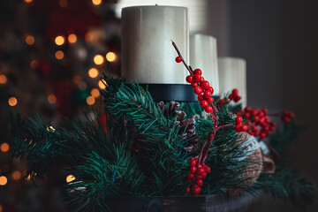 A charming centerpiece of Christmas tables with beautiful candles and ornaments
