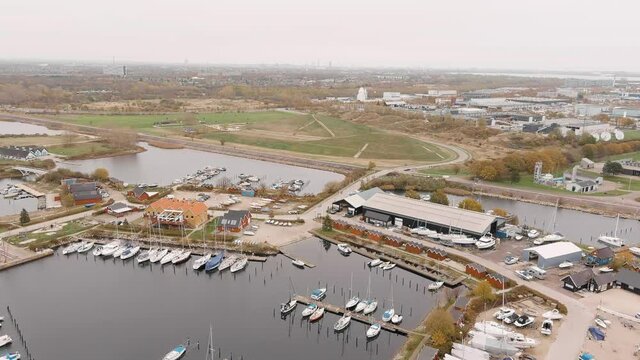 Aerial footage of Brondby Havn harbour in Copenhagen on a cloudy day 3