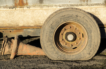 Old dirty flat truck tyre