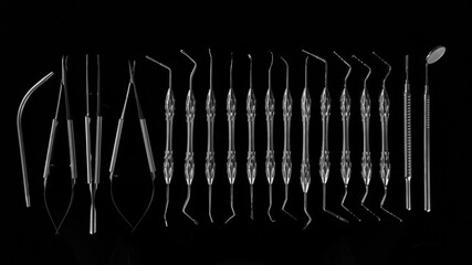 composition with dental instruments on a black background, in black and white style