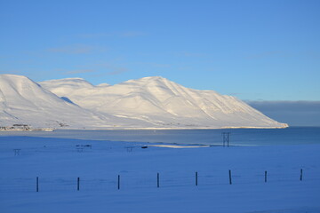 Walk through the frozen landscape during sunset. Iceland, Troll Peninsula