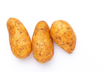 Potatoes isolated on white background. Flat lay. Top view.