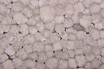 Macro close up of graphite polystyrene bubbles