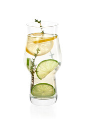 Fresh homemade lemonade with lime and thyme in iced glass on white background