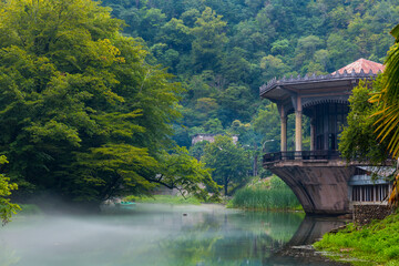 Fototapeta premium Beautiful landscape with old pavilion on the water