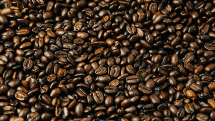 purely Colombian coffee beans in baso and grain