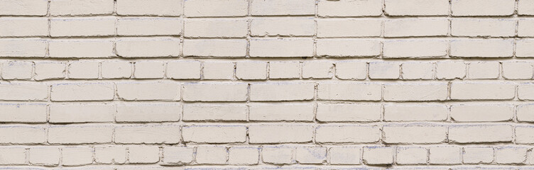 White and beige brick wall. Seamless pattern.