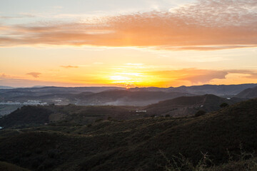 Sunset in mountains. Beautiful colorful sunset view.