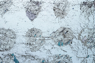 concrete wall with removed old paint and lime mechanically close up