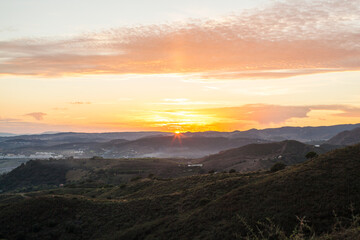 Sunset in mountains. Beautiful colorful sunset view.