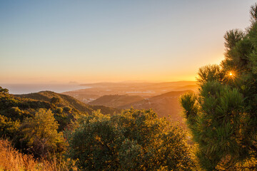 Sunset in mountains. Beautiful colorful sunset view.
