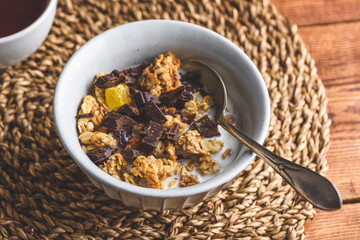 Bowl of Homemade Granola with Chocolate for Breakfast
